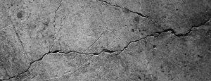 damaged and cracked concrete